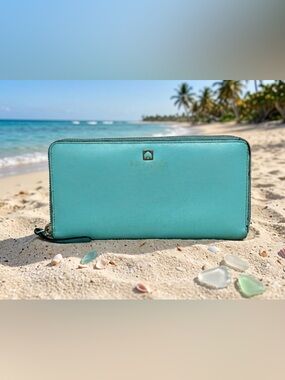 kate spade turquoise zip-around wallet with gold spade logo